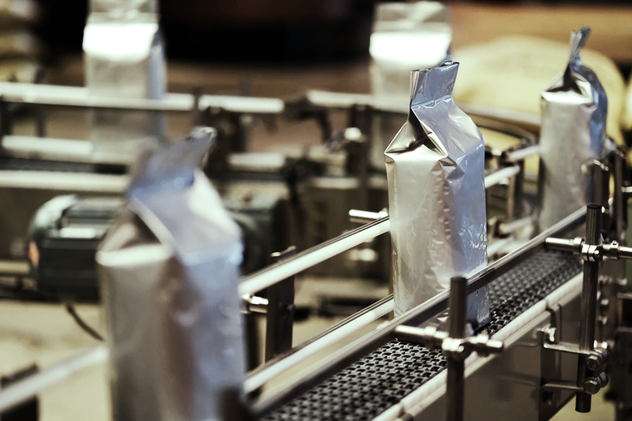 product samples being packaged on an assembly line